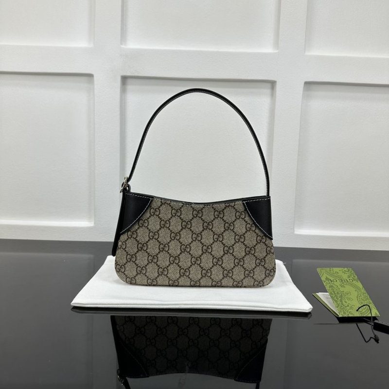 G*u*i top handle bags